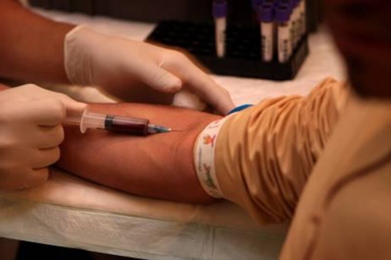 SHARJA-NOVEMBER 17,2008 - Students of Sharja University Mens College , Higher College of Technology have their blood test for Thalassaemia a genetic disease known to mankind.  ( Paulo Vecina/The National ) *** Local Caption ***  PV blood test 11.JPGPV blood test 11.JPG