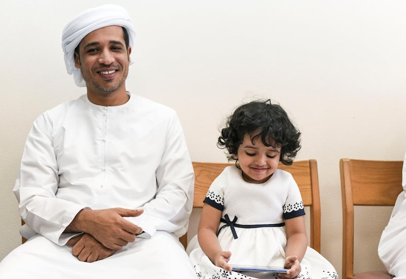 Abu Dhabi, United Arab Emirates - Seta Abdulla Ali, 2, with her father Ahmed Abdulla Ali, 34, at Sheikh Khalifa Medical City in Abu Dhabi. Khushnum Bhandari for The National
