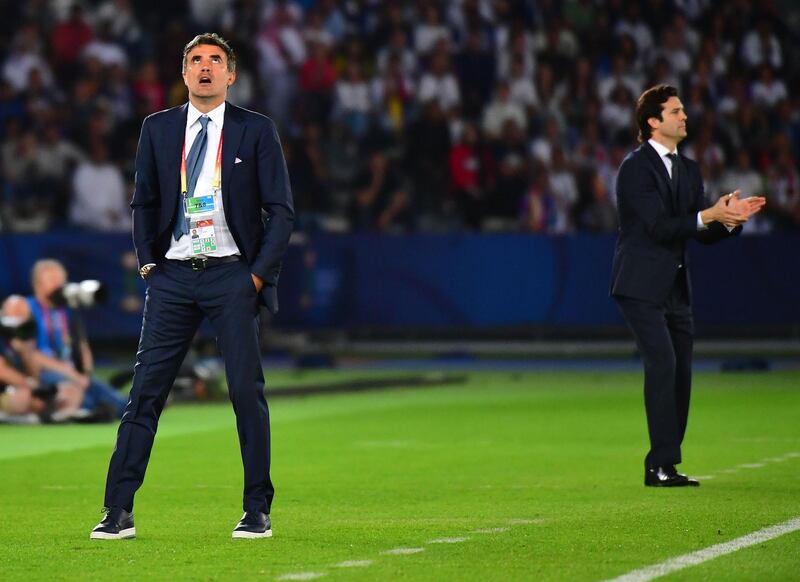 Al-Ain's coach Zoran Mamic (L) reacts during the Final match in the FIFA Club World Cup football competition between Real Madrid and Al-Ain at the Zayed Sports City Stadium in Abu Dhabi, the capital of the United Arab Emirates, on December 22, 2018.  / AFP / Giuseppe CACACE
