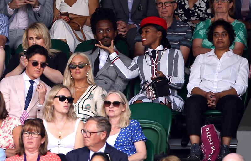 Janelle Monae (centre middle) on day one of the Wimbledon Championships at the All England Lawn Tennis and Croquet Club. PA