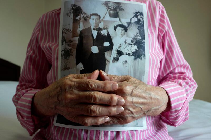 A South Korean separated family member Lee Chun-ja (88) holds a her wedding picture to give his North Korean family at Hanwha resort on Sokcho in Gangwon-do, South Korea. EPA