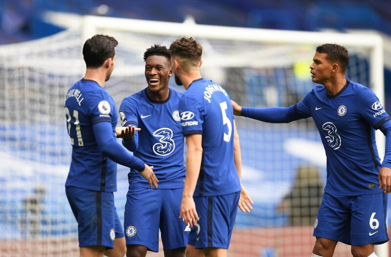 LONDON, ENGLAND - OCTOBER 03: Ben Chilwell of Chelsea celebrates with teammates Callum Hudson-Odoi, Jorginho and Thiago Silva after scoring his sides first goal during the Premier League match between Chelsea and Crystal Palace at Stamford Bridge on October 03, 2020 in London, England. Sporting stadiums around the UK remain under strict restrictions due to the Coronavirus Pandemic as Government social distancing laws prohibit fans inside venues resulting in games being played behind closed doors. (Photo by Mike Hewitt/Getty Images)