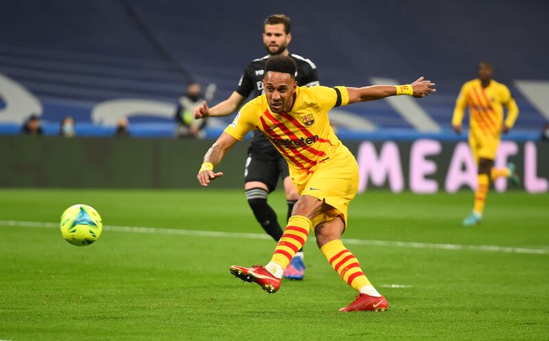 Pierre-Emerick Aubameyang has a shot on goal against Real Madrid. Getty Images