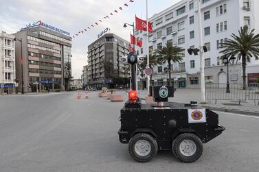A Tunisian police robot patrols along Avenue Habib Bourguiba in the centre of the capital Tunis on April 1, 2020. AFP