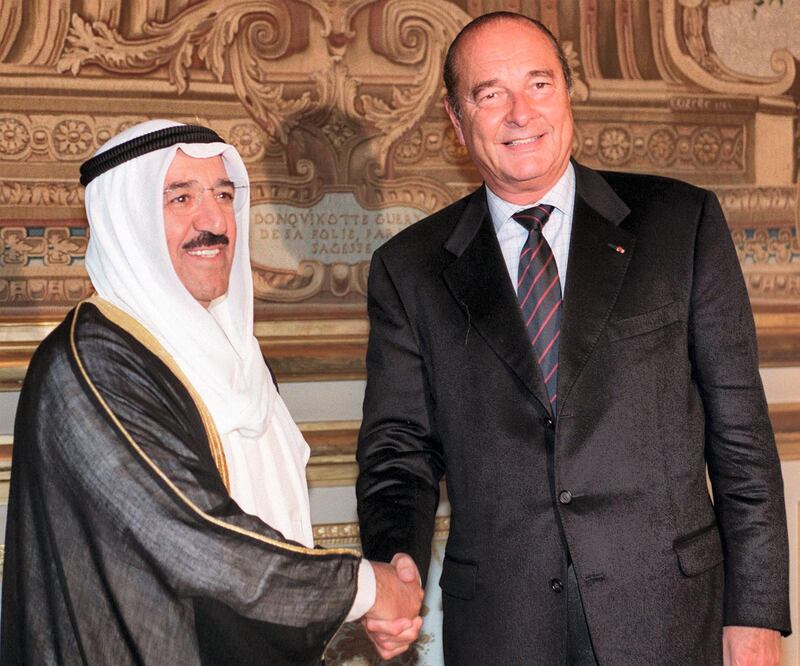 French President Jacques Chirac (R) shakes hands with Kuwaiti Vice Prime Minister and Foreign Minister Sheikh Sabah al-Ahmad al-Sabah at the Elysee Palace in Paris 07 September. Al-Sabah is in France on a two-day official visit. (Photo by ERIC FEFERBERG / POOL / AFP)