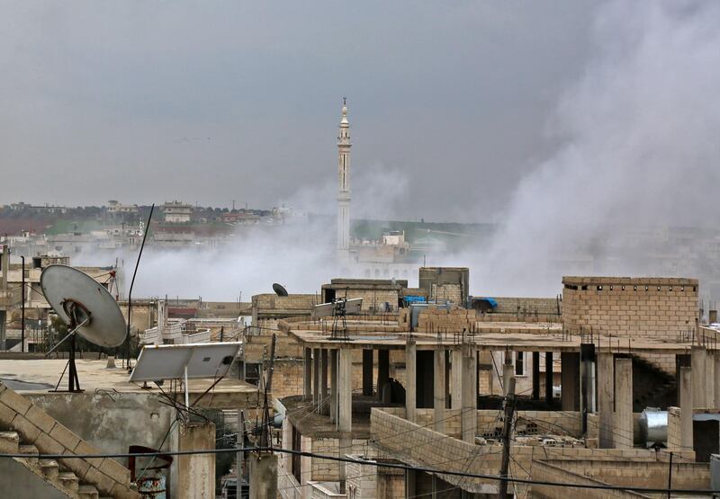 Smoke billows following a strike in the town of Khan Shaykhun in the southern countryside of the rebel-held Idlib province, on February 15, 2019. / AFP / Anas AL-DYAB
