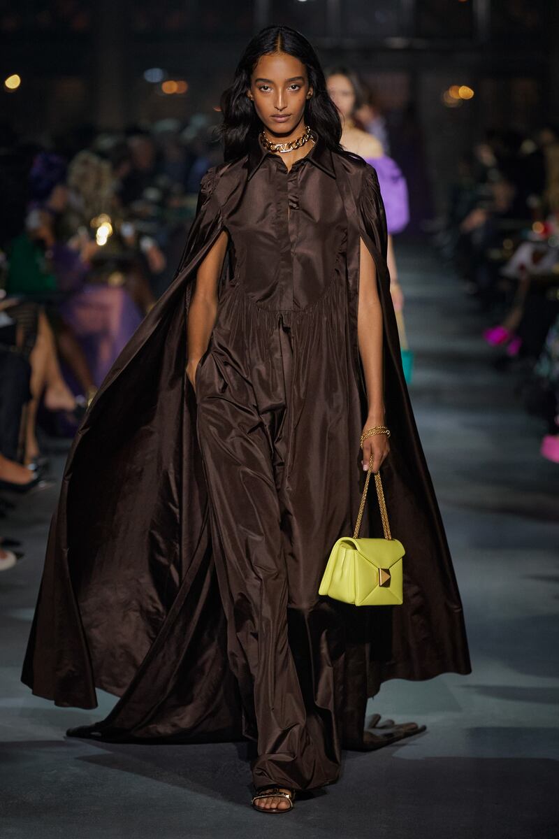 A chocolate caped look from the Valentino spring/summer 2022 show