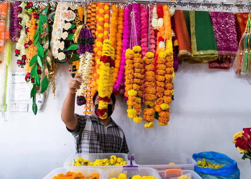 DUBAI, UNITED ARAB EMIRATES.  1 MARCH 2021. 
Hindu flower shop in Bur Dubai.
Photo: Reem Mohammed / The National
Reporter: Kelly