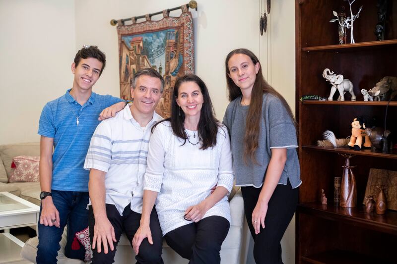  Brandon Rowberry with his wife Kimberly and children Sawyer and Alis at home in Al Barsha, Dubai. All photos: Ruel Pableo / The National