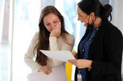 Sofiya Zhuravleva receives her GCSE results with Jane Clewlow, head of senior school at Brighton College, Dubai. Chris Whiteoak / The National