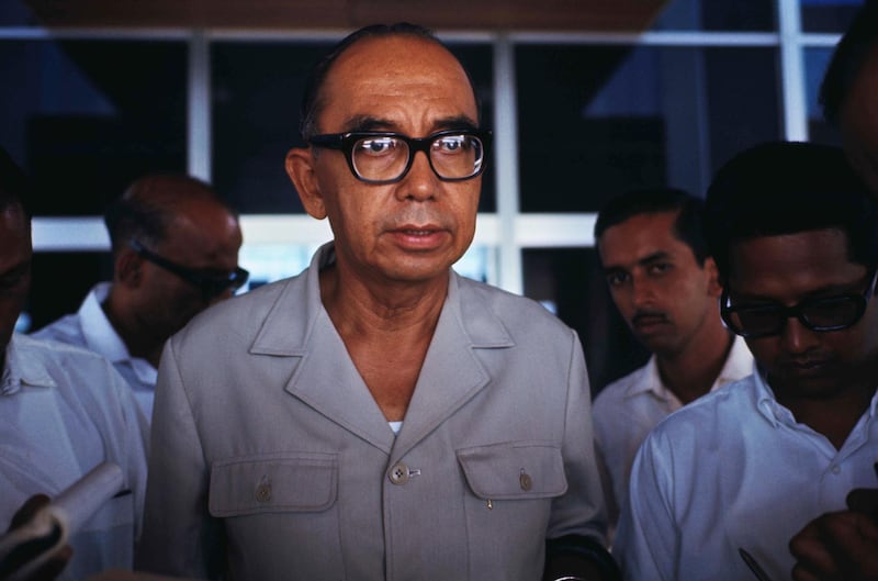 Abdul Trazak, the Prime Minister is shown in this closeup photo wearing glasses and a khaki shirt. Getty Images