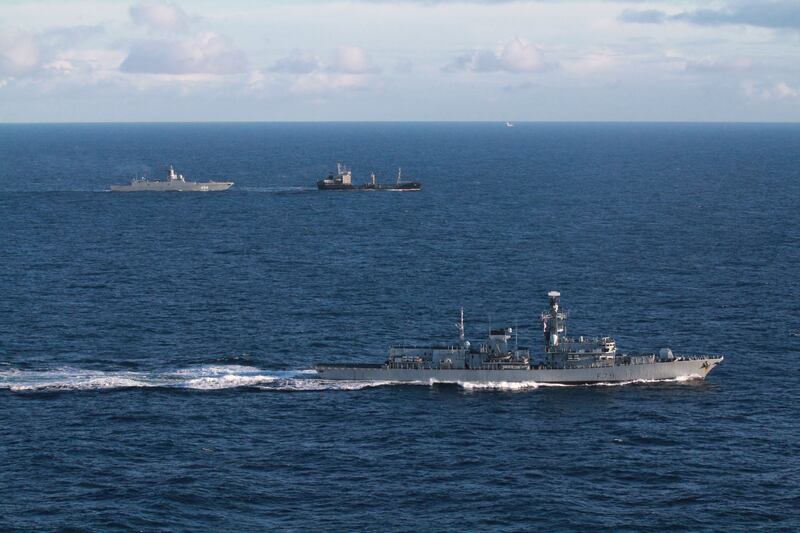 HMS Portland, bottom, tracks the Russian Admiral Gorshkov and accompanying tanker Kama as they sailed in international waters close to the UK in January. PA