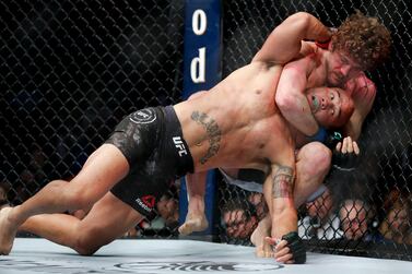 Ben Askren chokes Robbie Lawler in their welterweight mixed martial arts bout at UFC 235. AP Photo