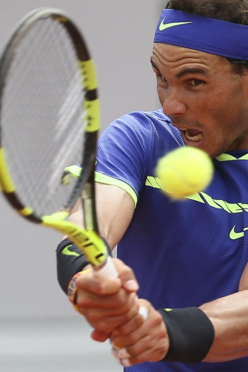Spain’s Rafael Nadal shows his power. AP Photo
