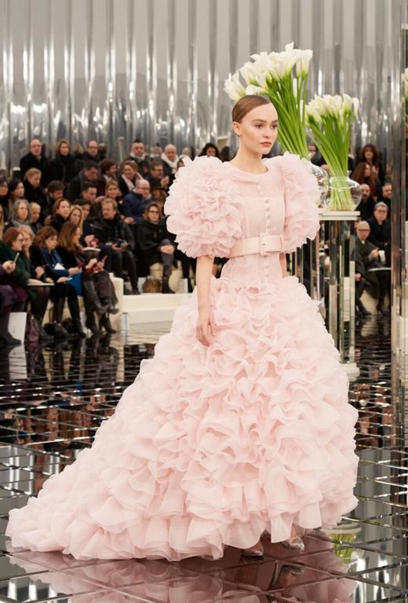 Every season, Chanel delivers at least one achingly beautiful gown that makes the world stop turning for a second, and this collection saw Lily-Rose Depp, daughter of Johnny Depp and Vanessa Paradis, step out in delicate, blush, swirling, ruched chiffon, which clung like clouds to her shoulders and tumbled mesmerisingly from her hips. The dropped waist bodice, still tightly belted, retained both proportion and space. Courtesy of Chanel