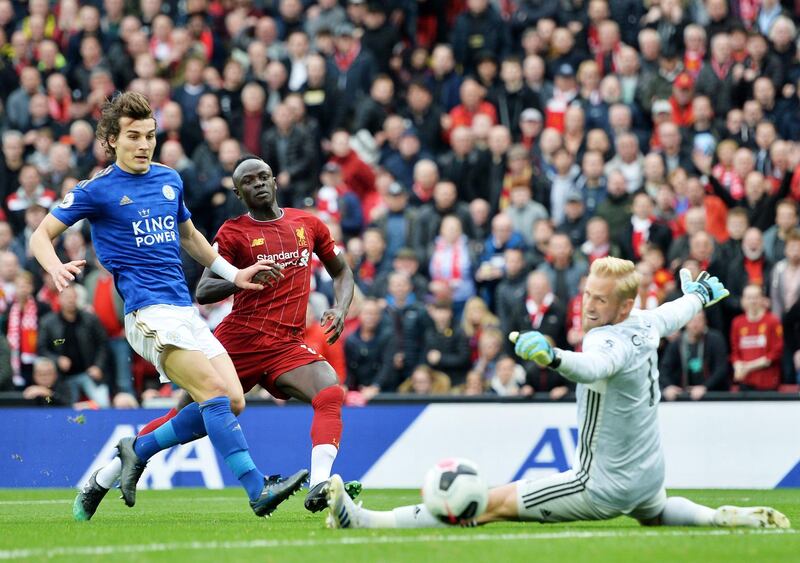 Mane scores the opening goal past Schmeichel and Soyuncu. EPA