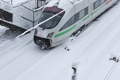 A high-speed train covered in snow following heavy snowfall on December 2 in Munich, Germany. Getty Images