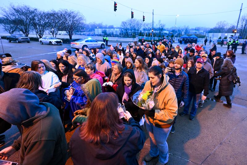 Fans line up to enter Graceland. AP