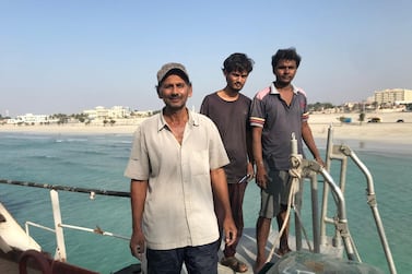 From left, second engineer Riasect Ali, 52, ordinary seamen Nirmal Singh-Bora, 22, and Monchand Sheikh, 26, on board the abandoned 'MT Iba'. Nick Webster 