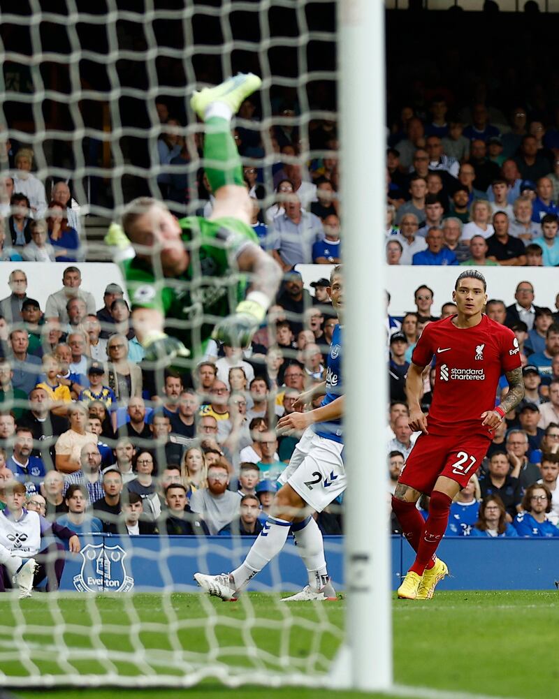 Everton's Jordan Pickford saves a shot from Liverpool's Darwin Nunez. Action Images 