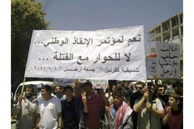 Syrian protesters demonstrate in Kfar Nebel village near the the province of Edlib.