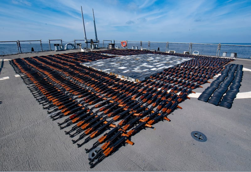 A photo released by the US Navy showing weapons that were seized from a stateless fishing vessel in the North Arabian Sea arranged for inventory on the flight deck of the ‘USS O'Kane'. AP