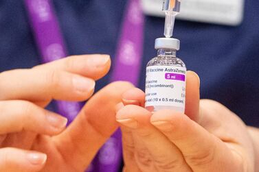 A nurse prepares a dose of the AstraZeneca/Oxford vaccine as the row grows over supplies from Britain to the EU. EPA