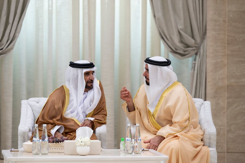 Sheikh Saif bin Zayed, Deputy Prime Minister and Minister of Interior, speaks with Sheikh Saif bin Mohamed at the reception. Photo: Abdulla Al Neyadi / UAE Presidential Court