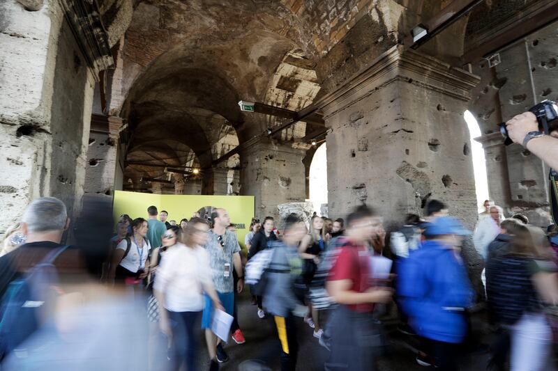Tourists are seen visiting the ancient Colosseum on Tuesday, October 3, 2017. Andrew Medichini / AP Photo