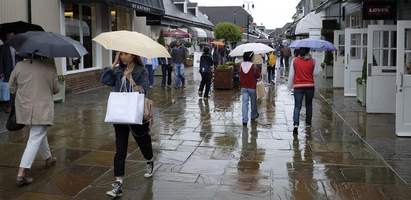 A falling pound has different outcomes for retailers in the UK. AP