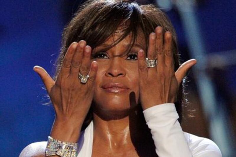 Whitney Houston accepting the Winner of International - Favorite Artist Award onstage at the 2009 American Music Awards. Getty Images / AFP