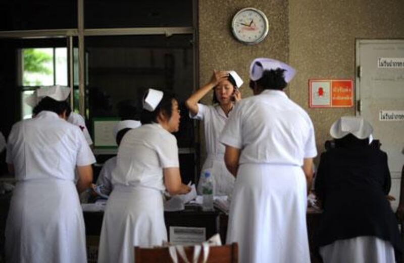 Nurses arrange the transfer of patients from Chulalongkorn Hospital  on April 30, 2010.