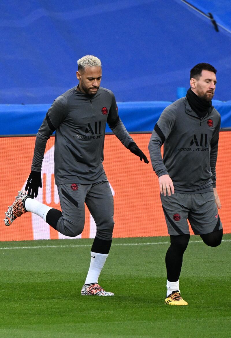 Brazilian forward Neymar and Lionel Messi attend a training session at the Santiago Bernabeu. AFP