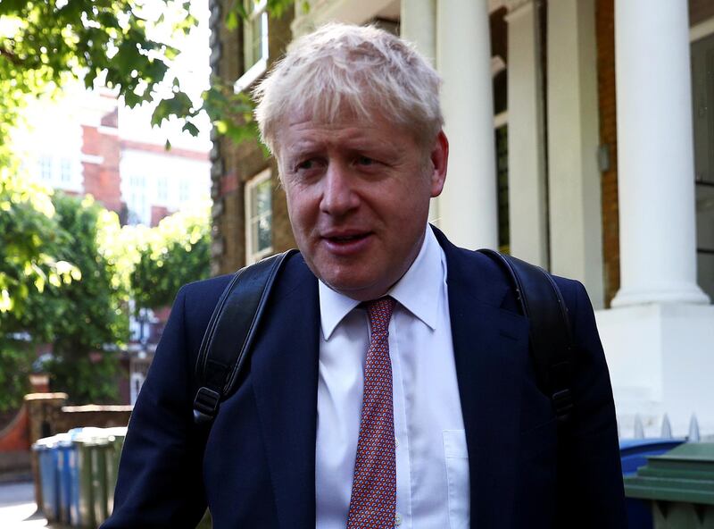 FILE PHOTO: Former British Foreign Secretary Boris Johnson, who is running to succeed Theresa May as Prime Minister, leaves his home in London, Britain, May 30, 2019. REUTERS/Hannah McKay/File Photo