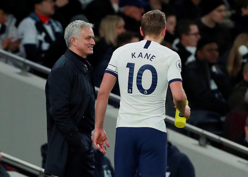 Tottenham Hotspur manager Jose Mourinho with Harry Kane. Reuters