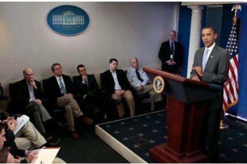 Barack Obama speaks on the debt limit impasse from the briefing room of the White House. Chip Somodevilla /EPA