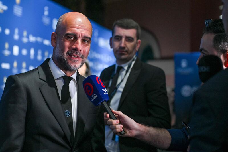 Manchester City manager Pep Guardiola speaks to the media as he arrives at the Dubai Globe Soccer Awards. AFP