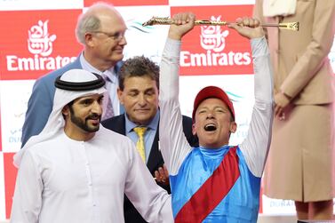 Sheikh Hamdan bin Mohammed Al Maktoum. Country Grammer ridden by Frankie Dettori wins the Dubai World Cup during The Dubai World Cup at Meydan racecourse in Dubai. Chris Whiteoak / The National