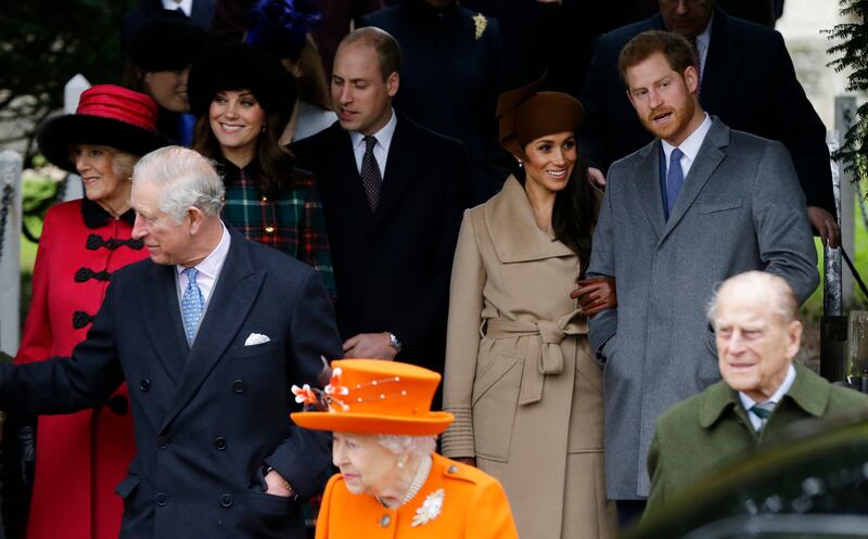 Front from left: Prince Charles, Queen Elizabeth II and Prince Philip. Rear From left, Camilla, Duchess of Cornwall, Kate, Duchess of Cambridge, Price William, Meghan Markle, and her fiancee Prince Harry, right, as they wait for the Queen to leave by car following the traditional Christmas Day church service, at St. Mary Magdalene Church in Sandringham, England, Monday, Dec. 25, 2017. (AP Photo/Alastair Grant)