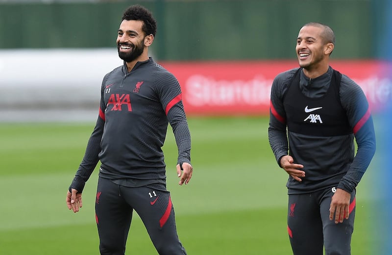 LIVERPOOL, ENGLAND - OCTOBER 13: (THE SUN OUT. THE SUN ON SUNDAY OUT) Mohamed Salah of Liverpool with Thiago Alcantara of Liverpoolduring a training session at Melwood Training Ground on October 13, 2020 in Liverpool, England. (Photo by John Powell/Liverpool FC via Getty Images)