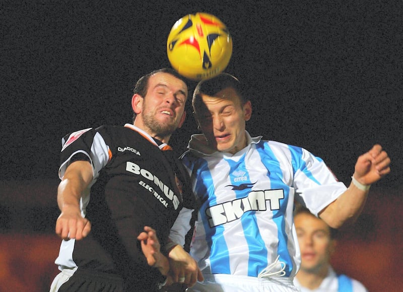 BRIGHTON, UNITED KINGDOM - DECEMBER 16:  Stuart Elliott of Hull challenges Gary Hart of Brighton during the Coca-Cola Championship match between Brighton & Hove Albion and  Hull City at the Withdean Stadium on December 16, 2005 in Brighton, England.  (Photo by Mike Hewitt/Getty Images)