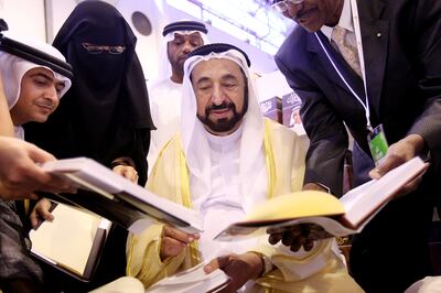 United Arab Emirates - Sharjah - October 26, 2010.

NATIONAL: H.H. Sheikh Dr Sultan Bin Mohammed Al Qasimi signs copies of his autobiography at the Sharjah International Book Fair at the Sharjah Expo Centre on Tuesday, October 26, 2010. Amy Leang/The National