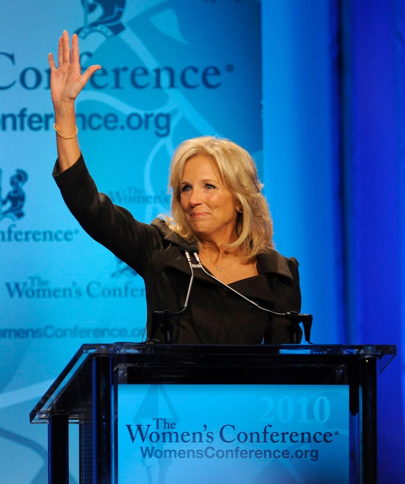 epa02414020 Dr. Jill Biden waves prior to addressing the opening session of The Women's Conference in Long Beach, California USA 26 October 2010. The event is part of the 3-day Women's Conference which brings together world opinion leaders and is the premier forum for women in the United States.  EPA/MIKE NELSON
