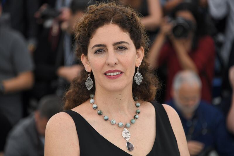 Palestinian director/writer and member of the Un Certain Regard jury Annemarie Jacir poses on May 9, 2018 during a photocall for the Un Certain Regard Jury at the 71st edition of the Cannes Film Festival in Cannes, southern France.  / AFP PHOTO / LOIC VENANCE