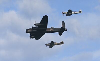 From top, a Spitfire, a Lancaster bomber and a Hurricane will take part in the platinum fly-past. PA