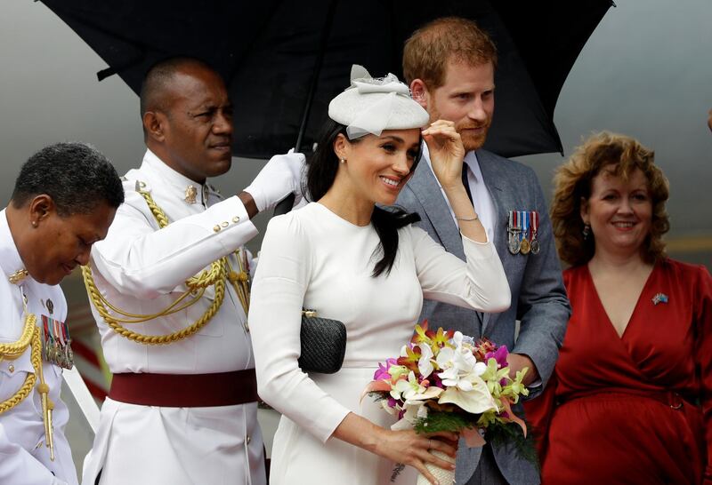 Britain's Prince Harry and Meghan, Duchess of Sussex on their arrival in Suva, Fiji. AP Photo