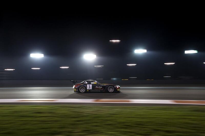 Khaled Al Qubaisi in his Team Abu Dhabi by Black Falcon car races past at the Yas Marina Circuit. Christopher Pike / The National