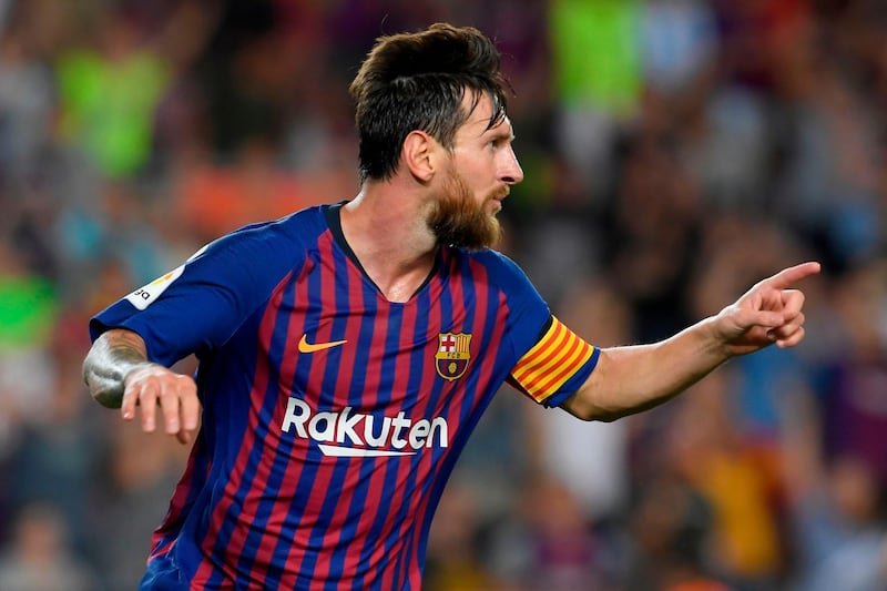 Barcelona's Argentinian forward Lionel Messi celebrates after scoring his team's third goal during the Spanish league football match between Barcelona and Alaves at the Camp Nou stadium in Barcelona on August 18, 2018. (Photo by LLUIS GENE / AFP)
