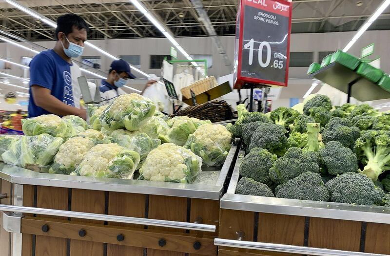 DUBAI, UNITED ARAB EMIRATES , September 13 – 2020 :- Shoppers wearing protective face mask as a preventive measure against the spread of coronavirus inside the Carrefour hypermarket at Ibn Battuta Mall in Dubai.  (Pawan Singh / The National) For News/Stock