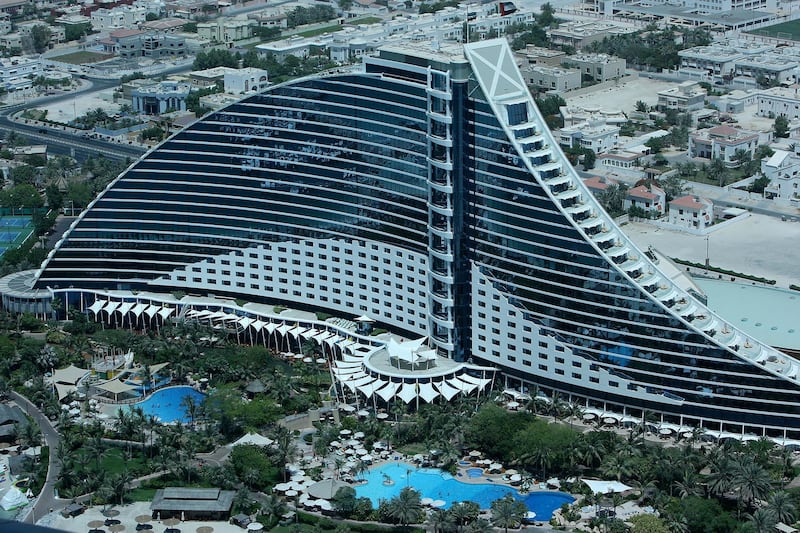 
DUBAI, UNITED ARAB EMIRATES – May 21: Jumeirah Beach Hotel as seen from Burj Al Arab Hotel in Dubai. (Pawan Singh / The National)
 *** Local Caption ***  PS001-JUMEIRAH BEACH HOTEL.jpgPS001-JUMEIRAH BEACH HOTEL.jpg